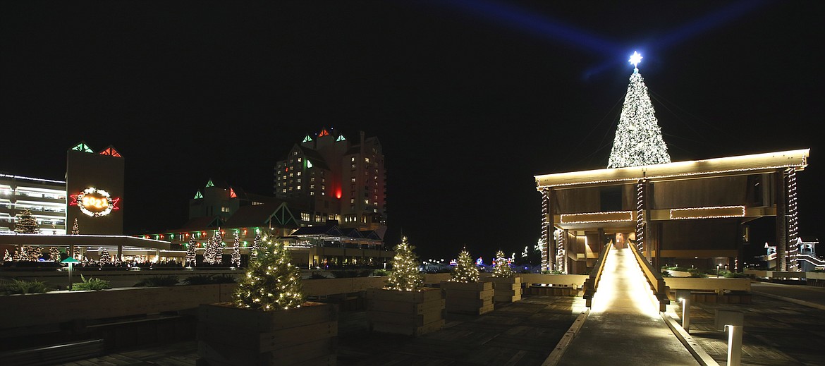 Hagadone Corporation headquarters and The Coeur d'Alene Resort shine  bright at the resort's lighting ceremony Friday.