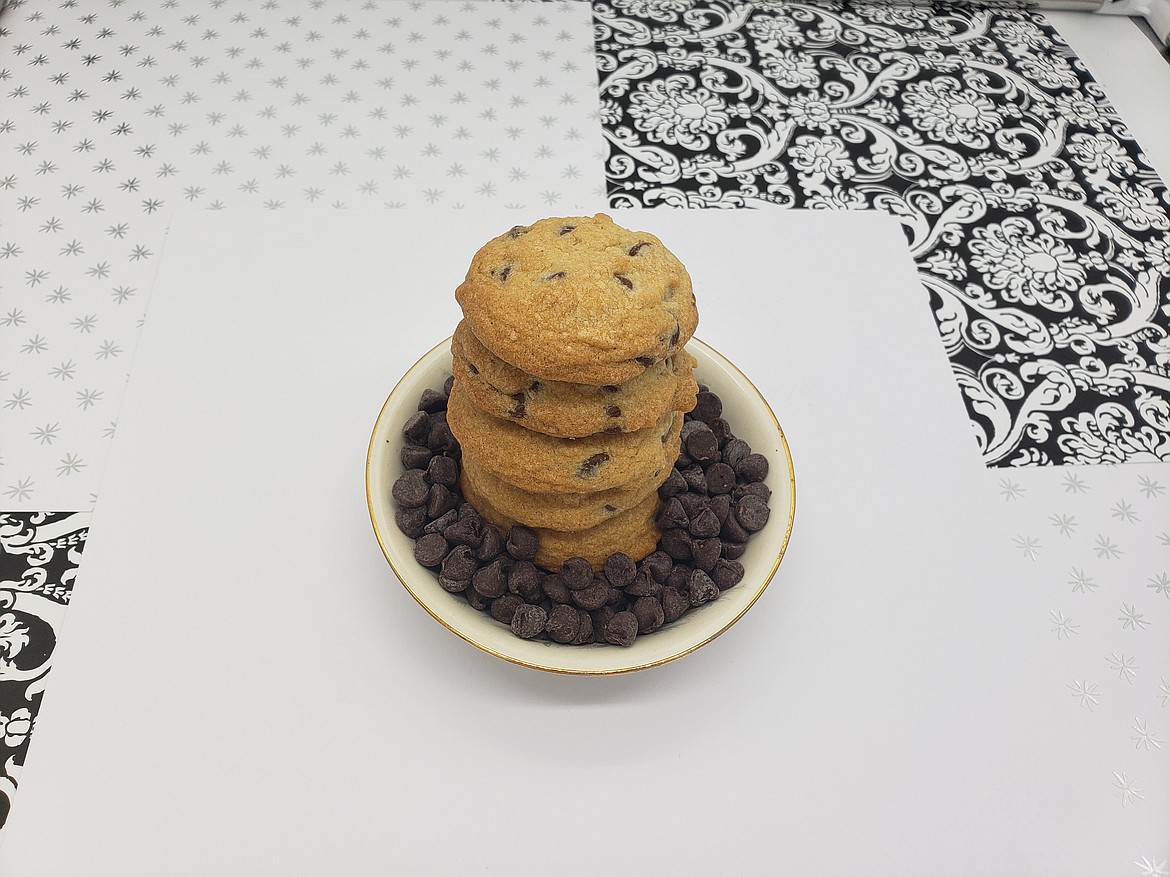 A pile of chocolate chip cookies fills a plate in the “Cookie Book,” written by Kris Emerson, co-owner of the Grocery Outlet in Moses Lake.