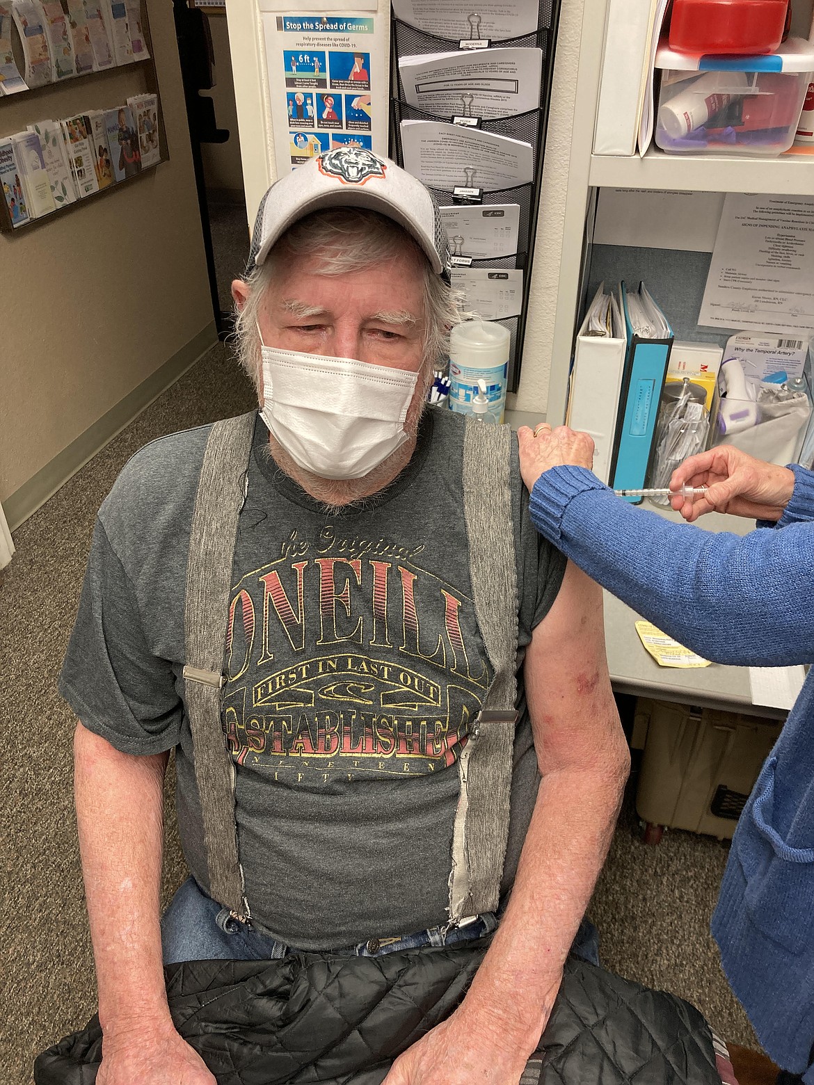 Randy Shermikas said he didn’t even feel it. He was part of a busy turnout lined up at the Sanders County Public Health Department when COVID booster vaccines became available for all adults throughout Montana. Free COVID and flu vaccines are given at the health office in the lower level of the courthouse on Mondays 8 a.m.-noon and 1-4 p.m. (Carolyn Hidy/Valley Press)