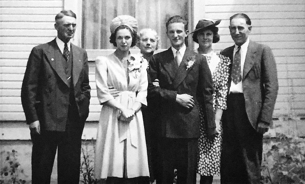 Norbert Herriges and his wife Jean Herriges, center, on their wedding day with their respective parents, Mr. and Mrs. Harrison and Anastasia and Nick Herriges. (Photo courtesy of Herriges family)