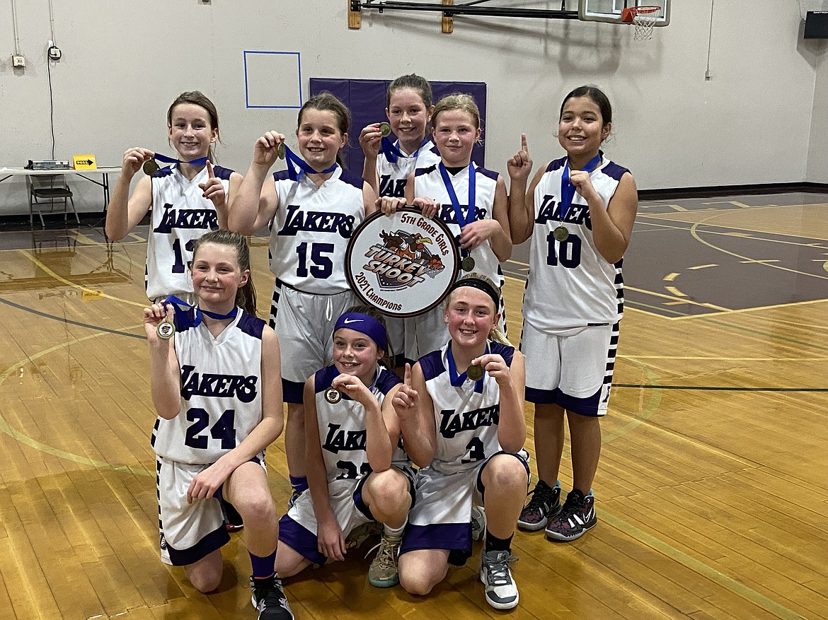Courtesy photo
The Coeur d'Alene Lakers fifth-grade AAU girls basketball team went 4-0 in The Warehouse Turkey Shootout Nov. 27-28 in Spokane, winning the championship over the Spokane Dawgs 24-16. In the front row from left are Ava Robertson, Greta Angle and Payton Brown; and back row from left, Noelia Axton, Savannah Stevens, Jaeli Hoffman, Brynlee Johnston and Aralynn Abrahamson.