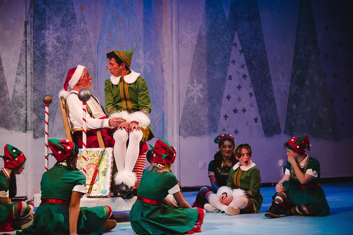 Scotty MacLaren as Santa and Mikey Winn as Buddy in Whitefish Theatre Co.'s production "Elf The Musical" photo by Matt Wetzler at Thewmatt Photograph