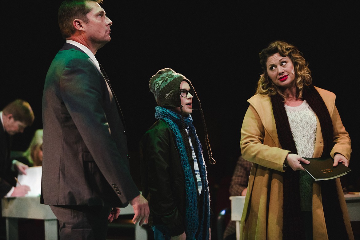 Rob Koelzer as Walter Hobbs, Landen Pullen as Michael Hobbs, and Joy James as Emily Hobbs in Whitefish Theatre Co'.s "Elf The Musical"- photo by Matt Wetzler at Thewmatt Photography