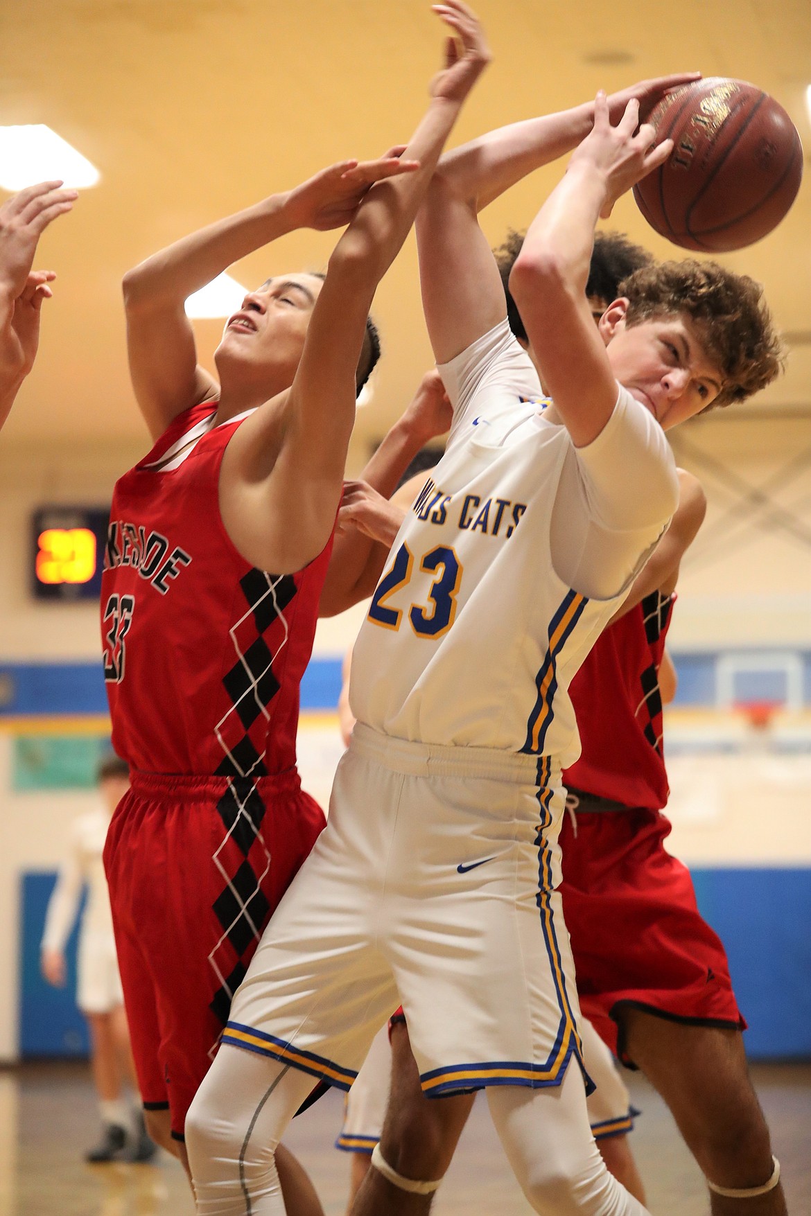 Ethan Howard battles for a rebound during a home game against Lakeside last season.