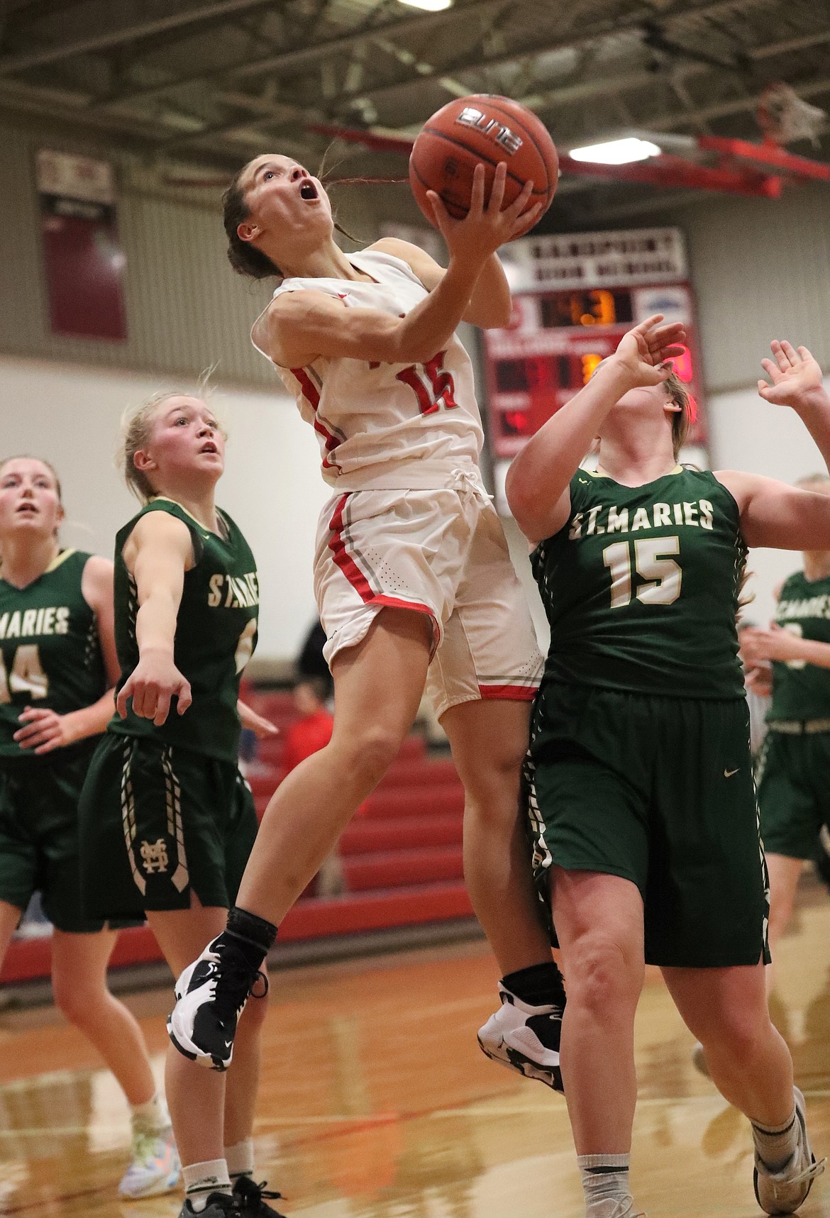 Aliya Strock attempts to make a circus layup in the closing seconds of the third quarter on Tuesday.