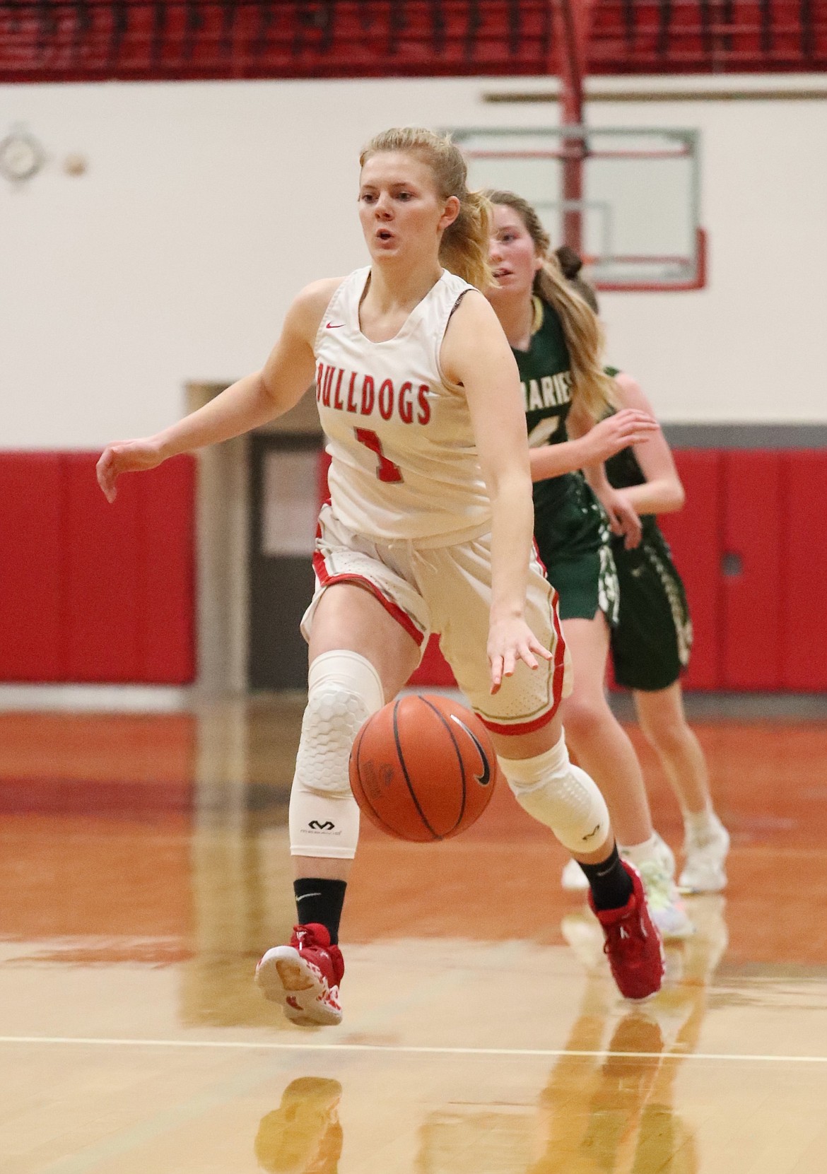 Kelsey Cessna drives toward the paint Tuesday.