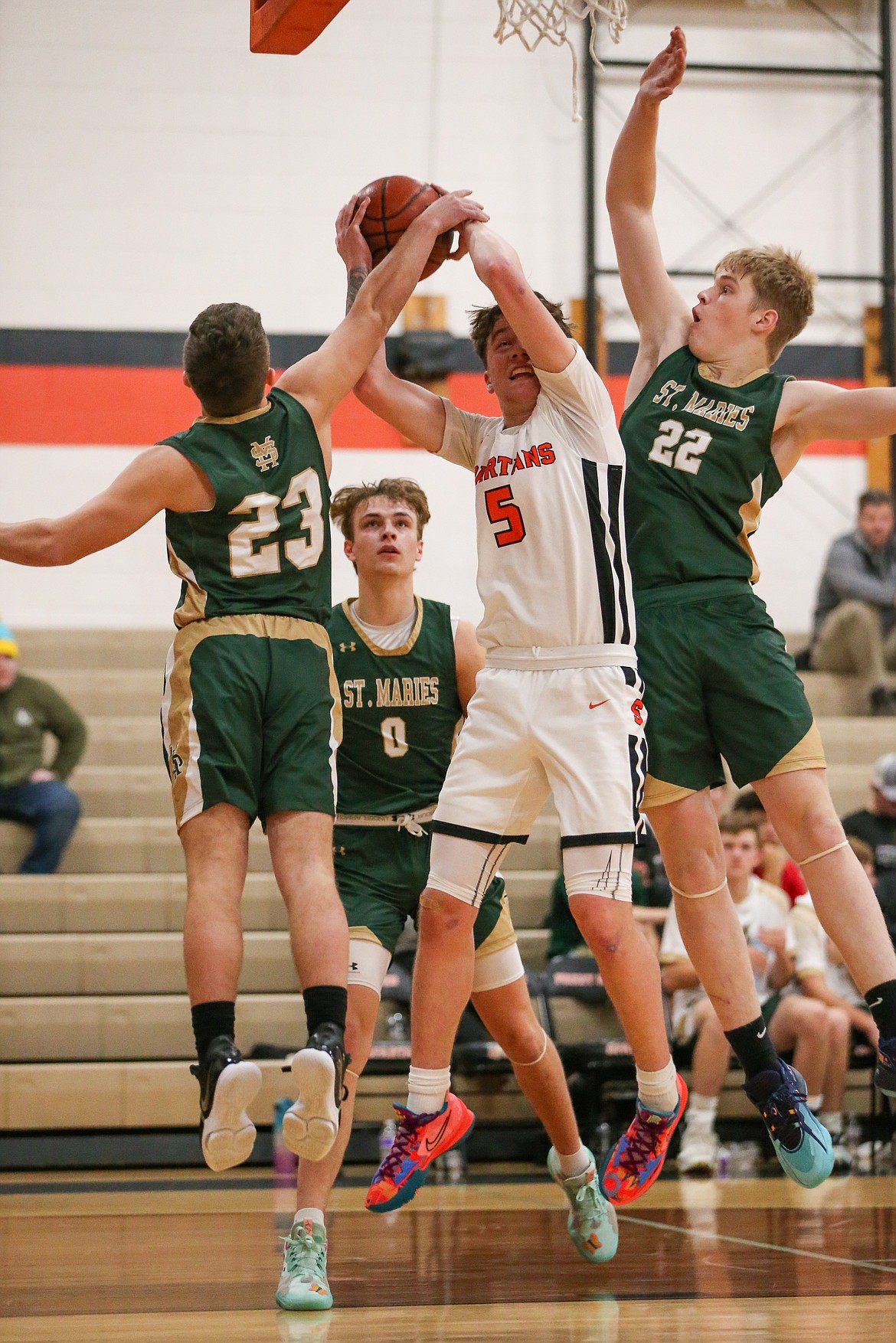 Trentyn Kreager fights through contact as he looks for a basket Tuesday.