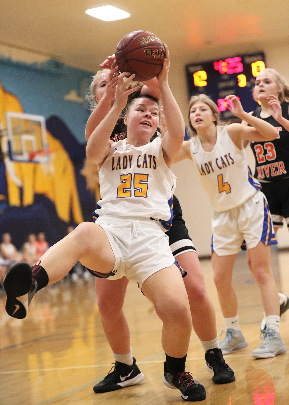 Clark Fork's Grace Yancey fights for a rebound.