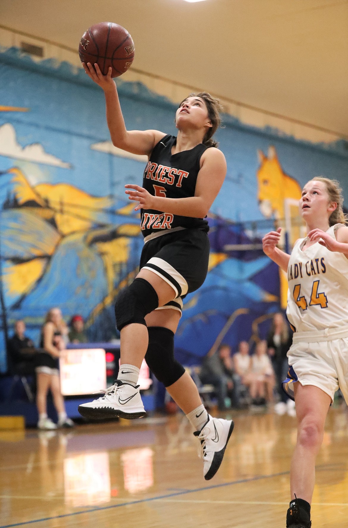 Priest River's Lilly Freitas elevates to attempt a layup.