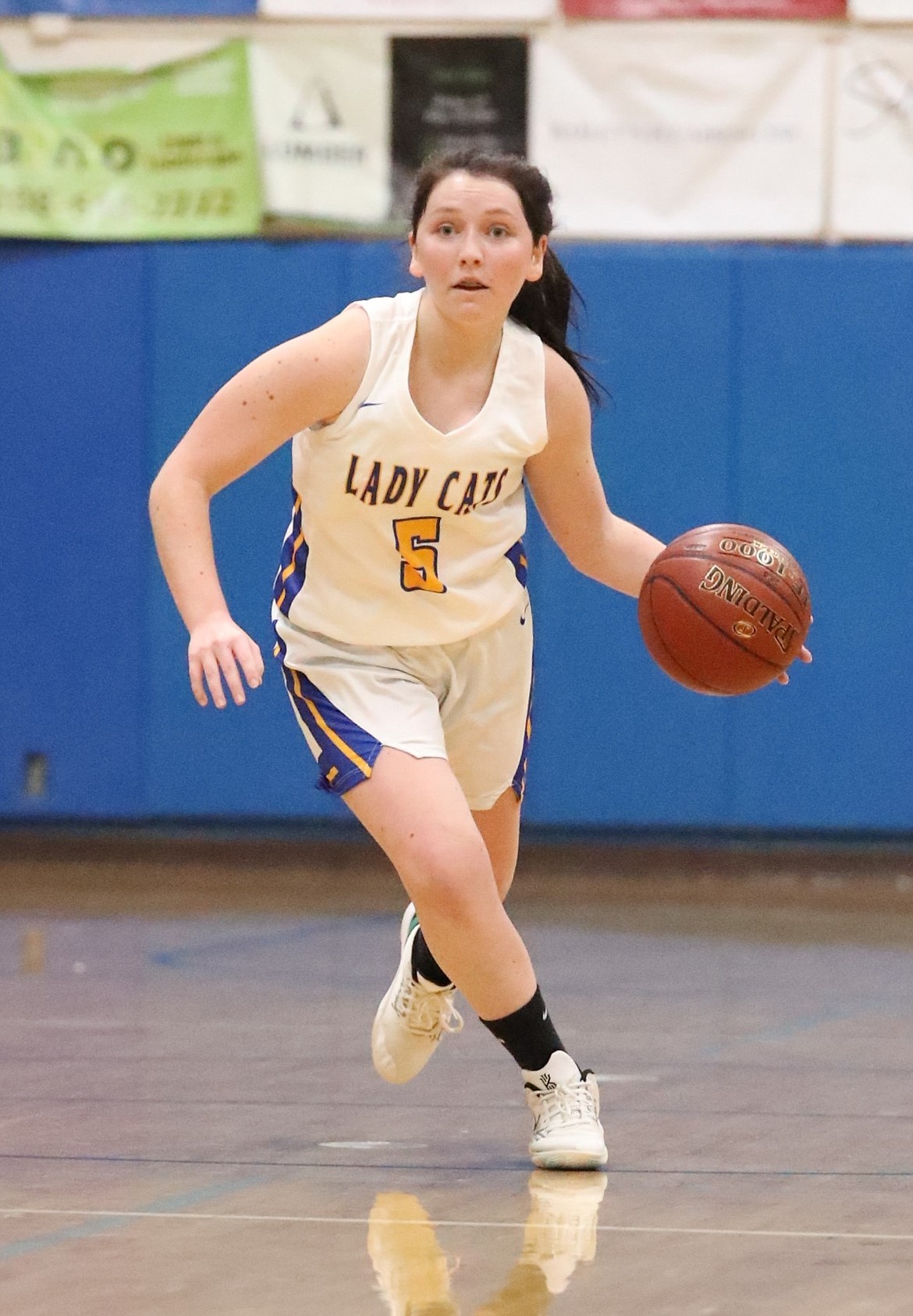 Clark Fork's Lilly Reuter brings the ball up the court.
