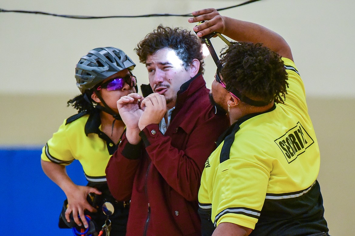 From left, Nadja Simmonds portrays Hero; Calvin Adams portrays Don John and Ethan Miles Perry portrays Leonato during a performance of William Shakespeare's "Much Ado About Nothing" by Shakespeare in the Schools at West Valley School on Wednesday, Dec. 1. (Casey Kreider/Daily Inter Lake)