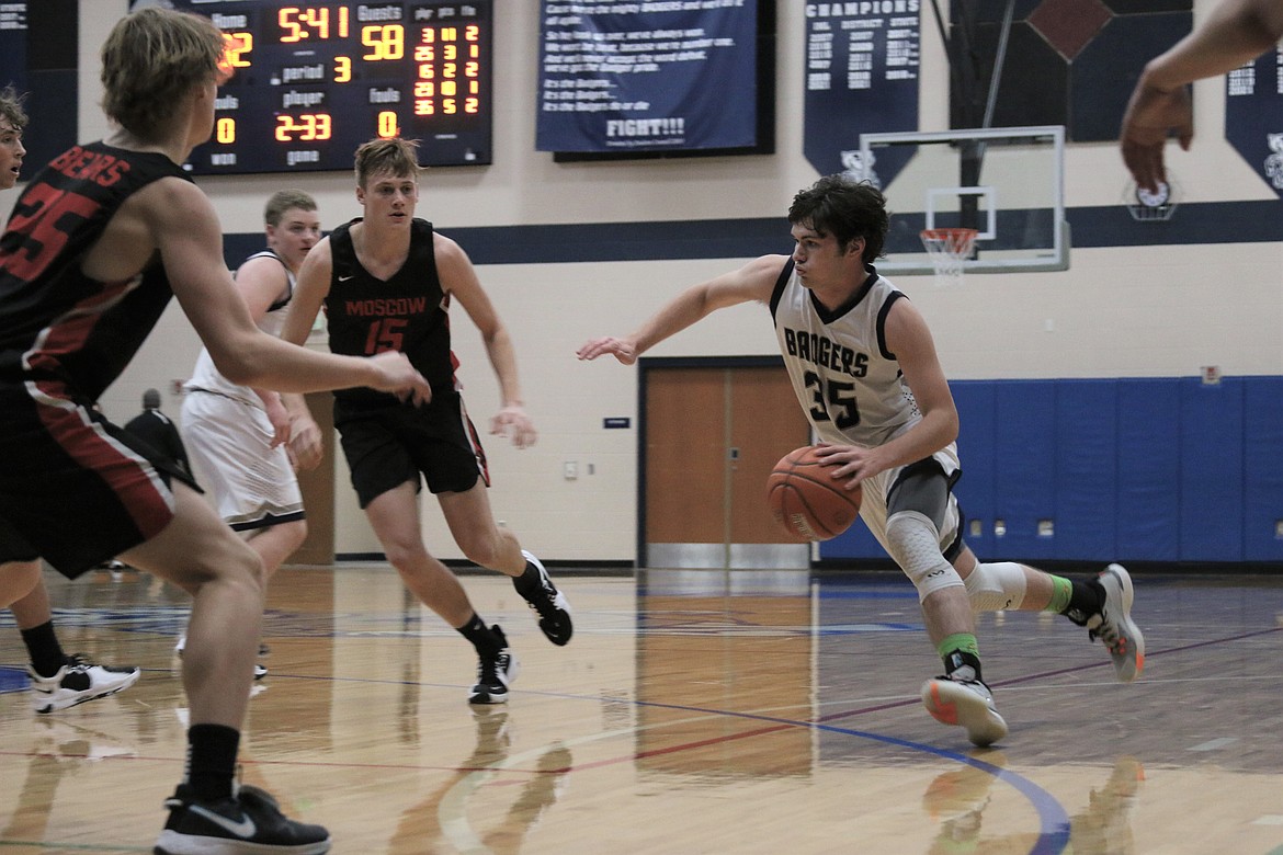 Junior Braeden Blackmore drives the ball against the Moscow defense.