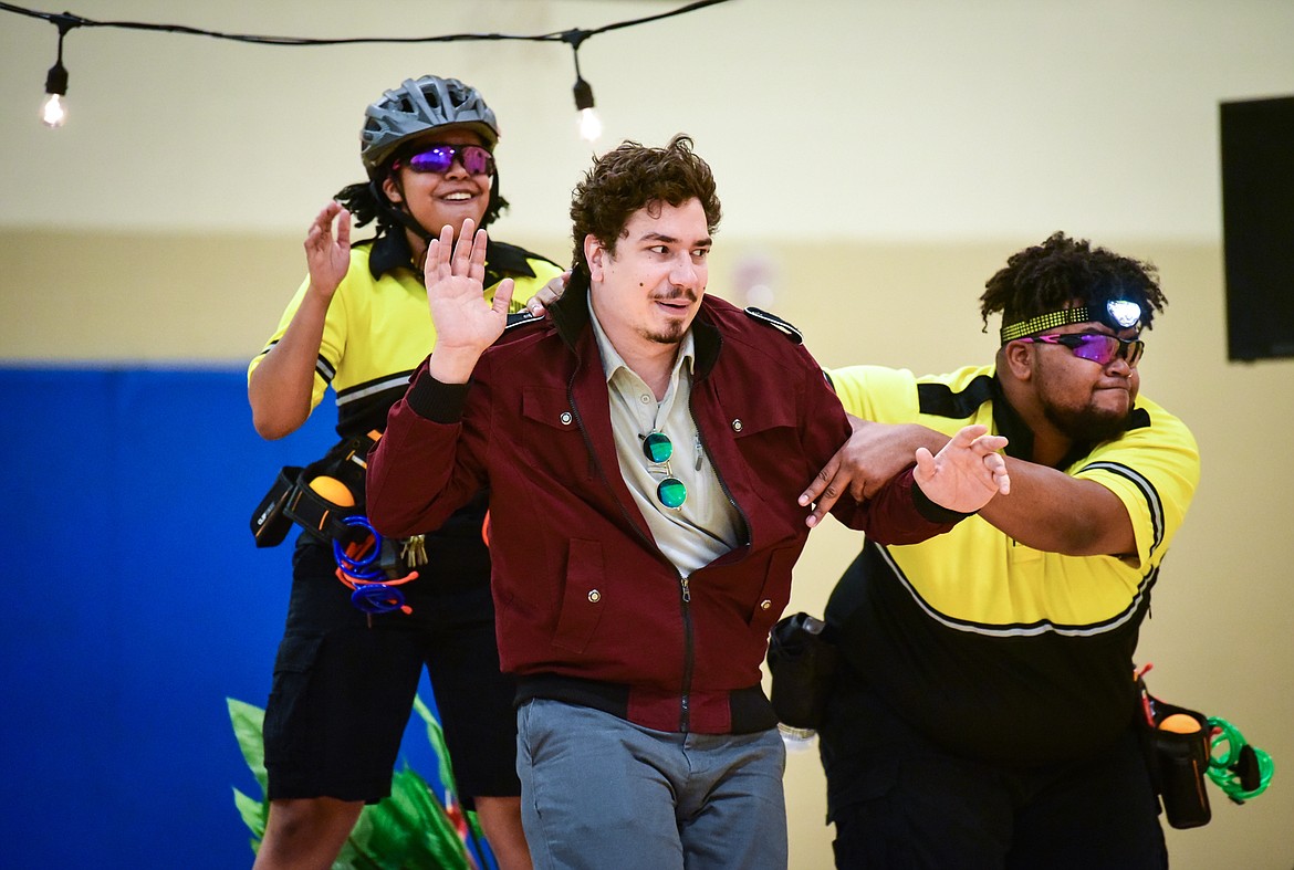 From left, Nadja Simmonds portrays Hero; Calvin Adams portrays Don John and Ethan Miles Perry portrays Leonato during a performance of William Shakespeare's "Much Ado About Nothing" by Shakespeare in the Schools at West Valley School on Wednesday, Dec. 1. (Casey Kreider/Daily Inter Lake)