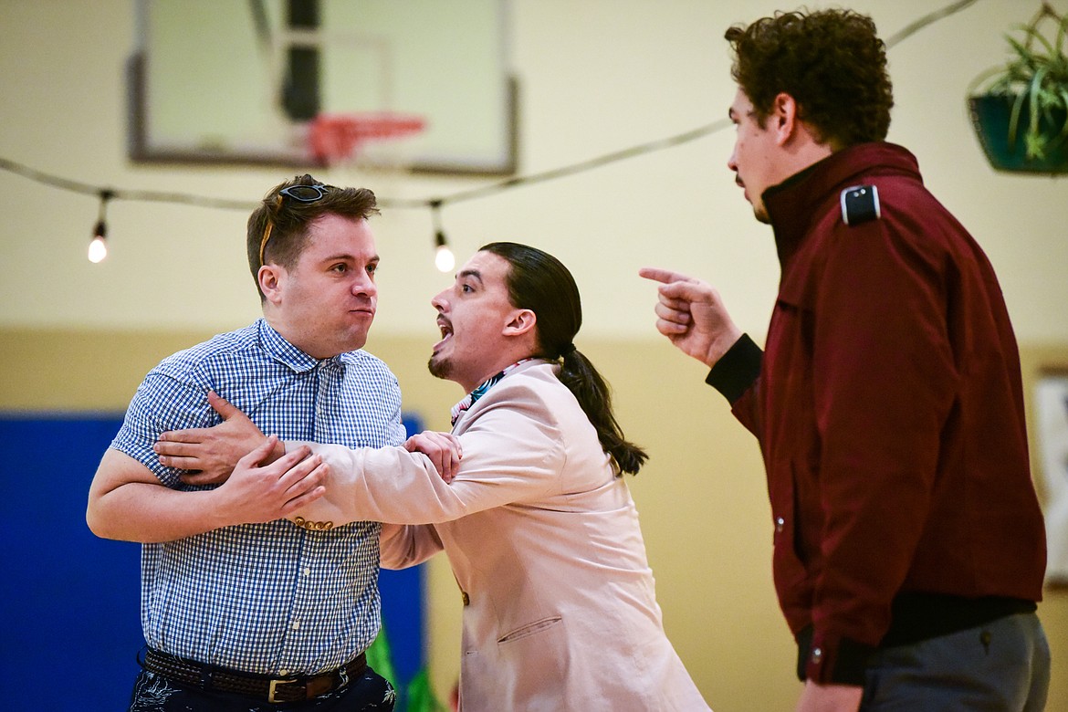 From left, Sam Cheeseman portrays Claudio; Andres Enriquez portrays Don Pedro; and Calvin Adams portrays Don John during a performance of William Shakespeare's "Much Ado About Nothing" by Shakespeare in the Schools at West Valley School on Wednesday, Dec. 1. (Casey Kreider/Daily Inter Lake)