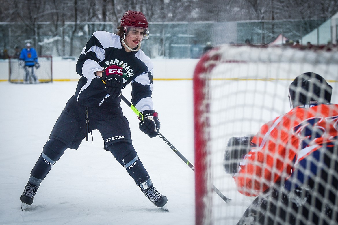 Tamarack Brewery's Calder Townsley (23) scores the game-winning goal during a round of penalty shots against the Idaho North Tropics at the Craft Brewers Cup at Woodland Park Ice Center in Kalispell on Saturday, Dec. 4. (Casey Kreider/Daily Inter Lake)