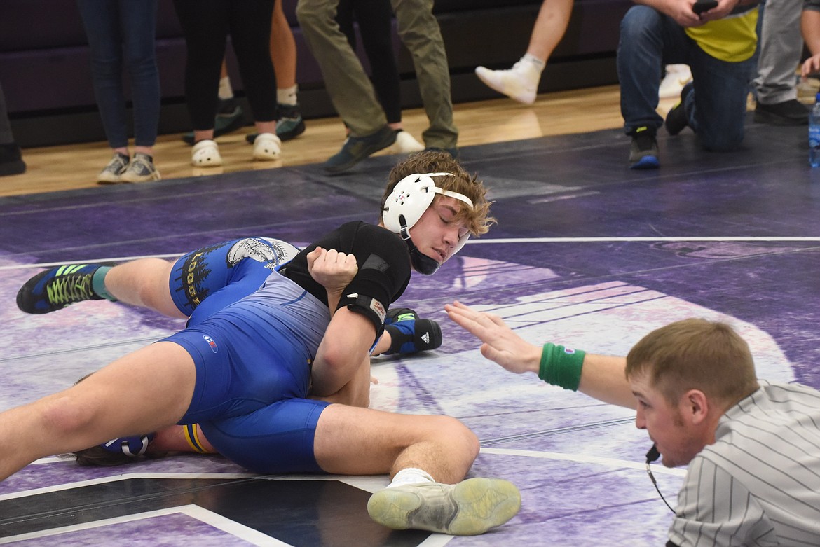 Thompson Falls’ Max Hannum waits for the pin call as he controls Libby’s Andrew Carmody Friday at the Owen Invitational in Polson. (Scott Shindledecker/Valley Press)