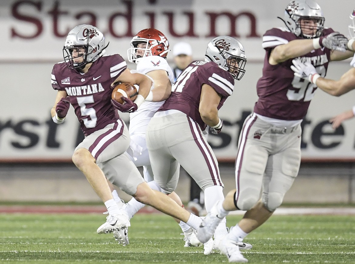 Montana’s Garrett Graves runs with the ball during a punt return in the second round of the NCAA FCS Playoff at Washington-Grizzly Stadium on Friday. (Tommy Martino/University of Montana)