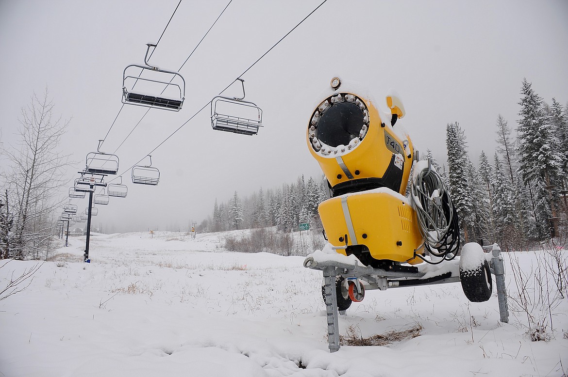 A snowmaking machine sits idle below Chair 6 at Whitefish Mountain Resort on Saturday, Dec. 4. (Matt Baldwin/Daily Inter Lake)