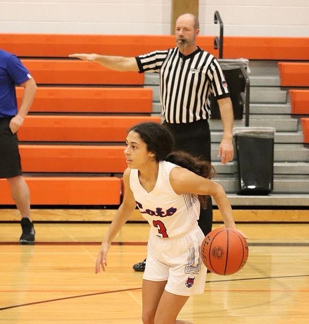 Superior's Isabella Pereira brings the ball upcourt Friday at the Ronan Tip-off Tournament. (Kami Milender photo)