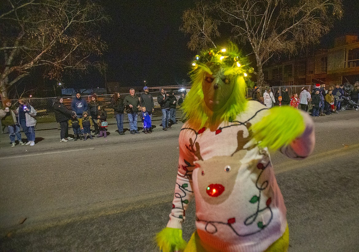 The Grinch greets the crowd.