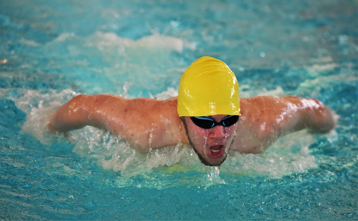 Gus Hertz competes in the 200 yard individual medley in Polson in December. (Scot Heisel/Lake County Leader)