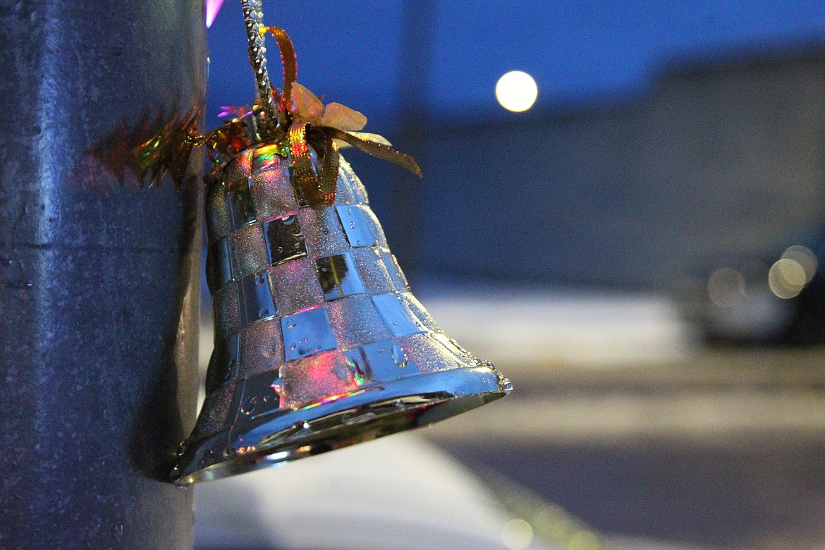 A bell decorates a light post on Mineral Avenue Dec. 4. (Will Langhorne/The Western News)