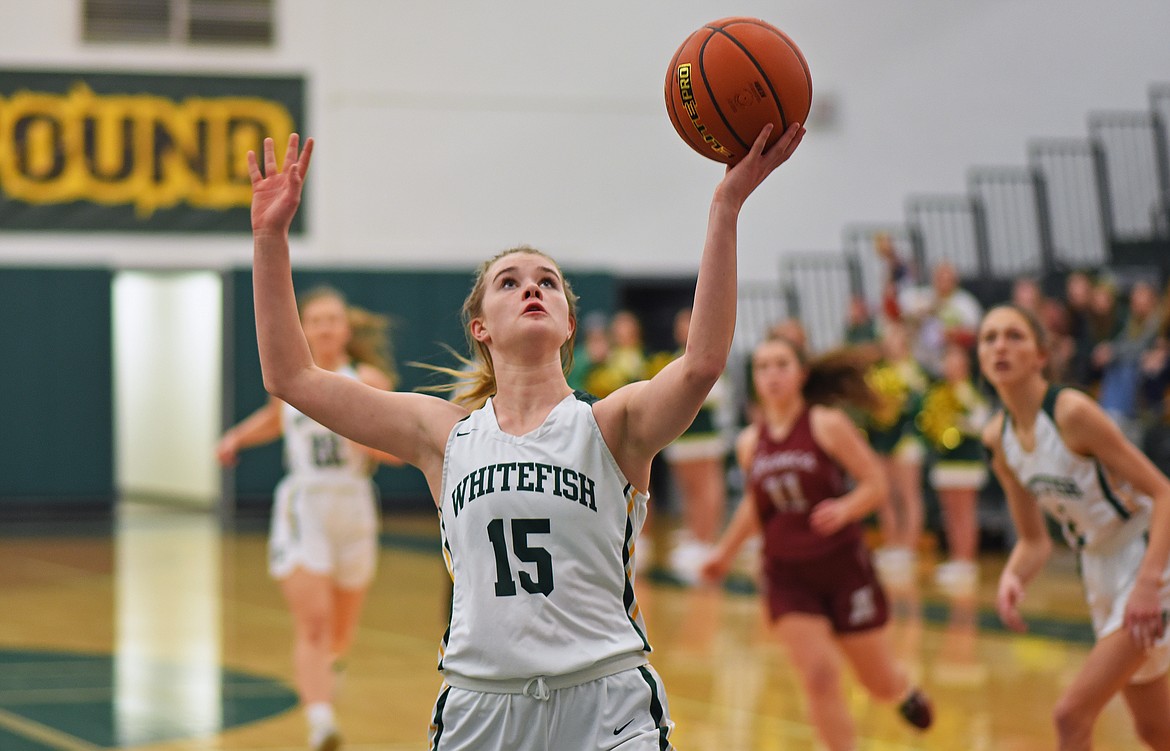 Lady Bulldog sophomore Bailey Smith drives to the hoop on a fast break during a game against Hamilton last year. (Whitney England/Whitefish Pilot)