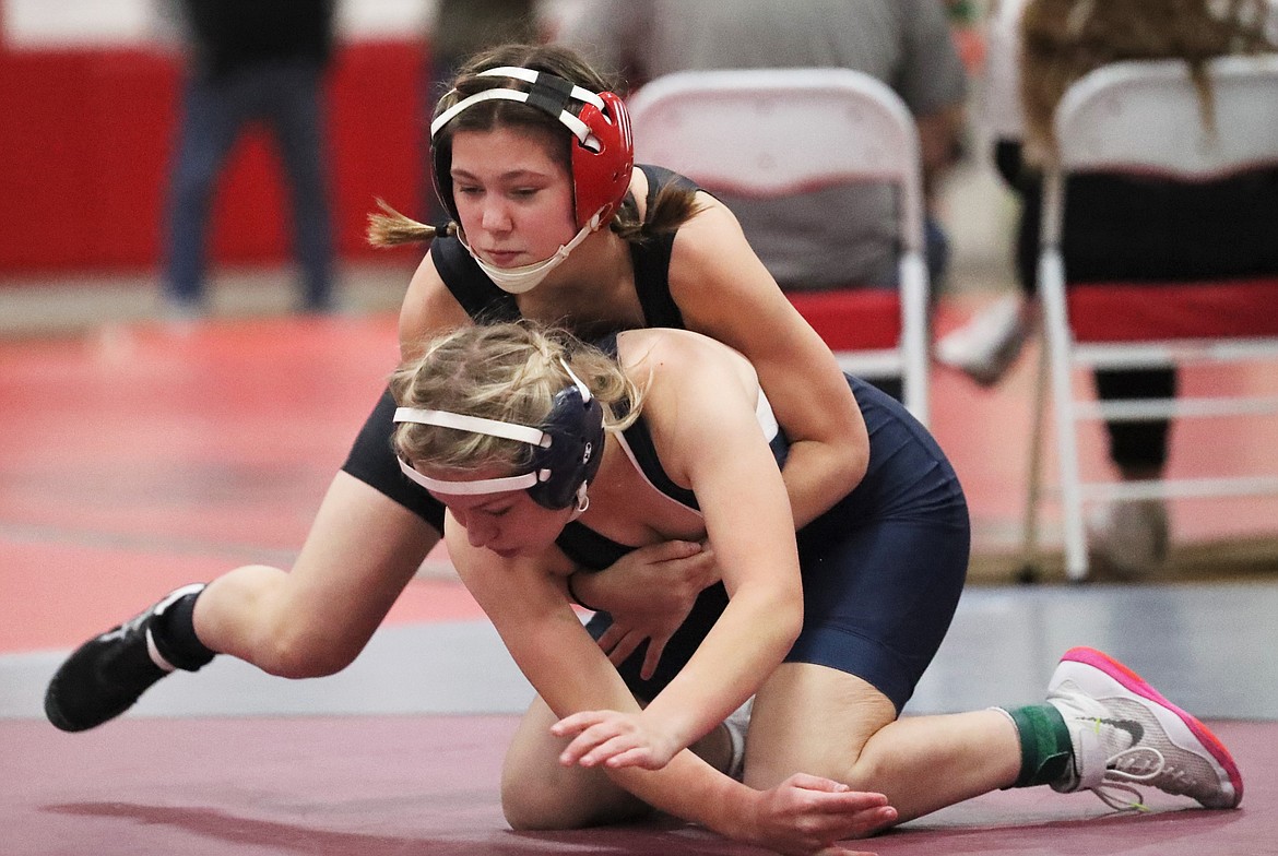 Emma Garman competes in Saturday's Blizzard JV Tournament at Sandpoint High. Garman is one of three girls on this year's Sandpoint wrestling team who will be vying for a spot in the first IHSAA sanctioned girls wrestling state tournament this winter.