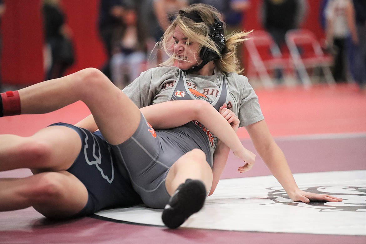 Helena White wrestles in a match Saturday at Sandpoint High.