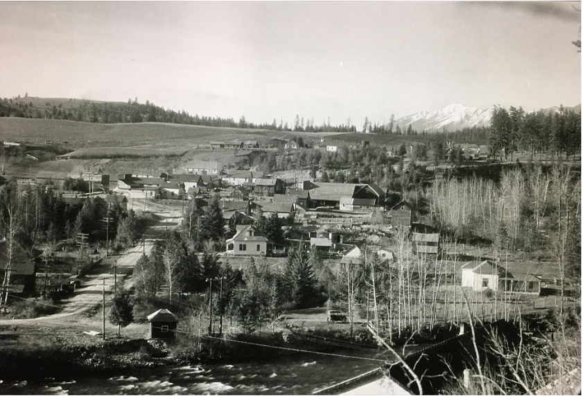 1926 view looking north from the top of the powerhouse. Chapman Hill far upper left few trees growing. Attribution – Ferde Green photograph, E.B. Gilliland Collection, Northwest Montana History Museum