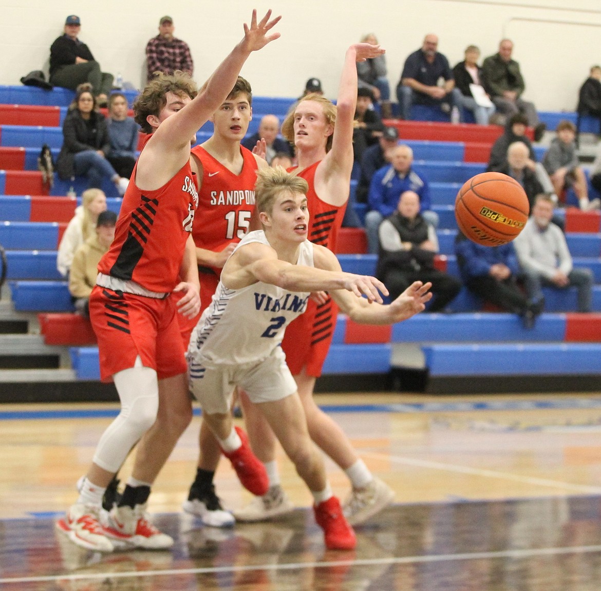 MARK NELKE/Press
Sam Entzi (2) of Coeur d'Alene passes out of the key to a 3-point shooter in the first half vs. Sandpoint on Tuesday night at Viking Court.