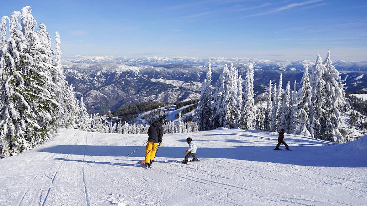 Skiers venture downhill in this file photo at Silver Mountain Resort.