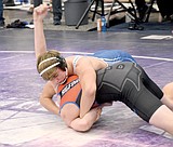 Wrestling team starts out season with win in Polson
