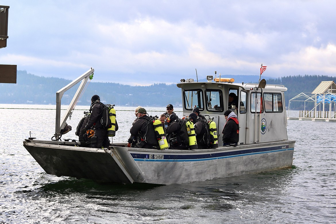 Eight members of the Kootenai County Sheriff's Office dive team pulled trash out of Lake Coeur d'Alene around Tubbs Hill and the Third Street boat launch Wednesday. HANNAH NEFF/Press