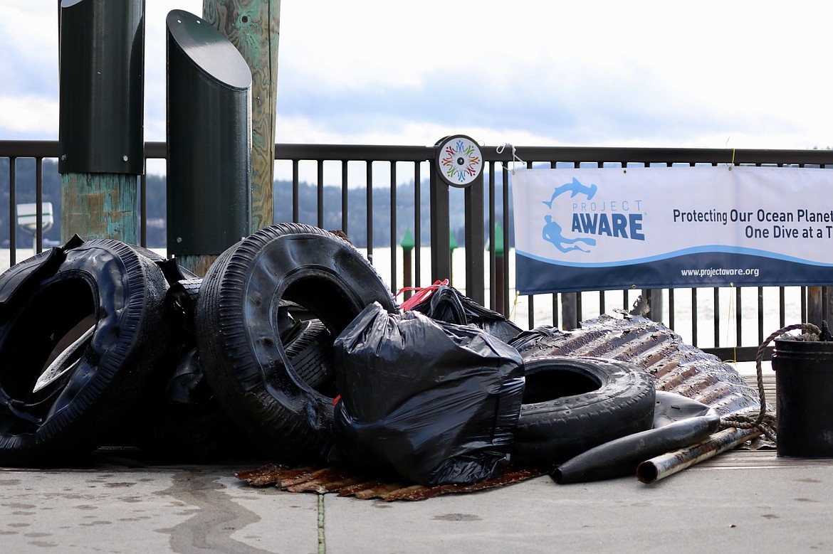 A clean up of the bottom of Lake Coeur d'Alene near Tubbs Hill was sponsored by a Couer d'Alene dive shop, Jake's Scuba Adventures, which has done cleanups like this one for 11 years. Owner Jacob Powlison said the shop is part of Project AWARE, a nonprofit organization that works with volunteer scuba divers. HANNAH NEFF/Press