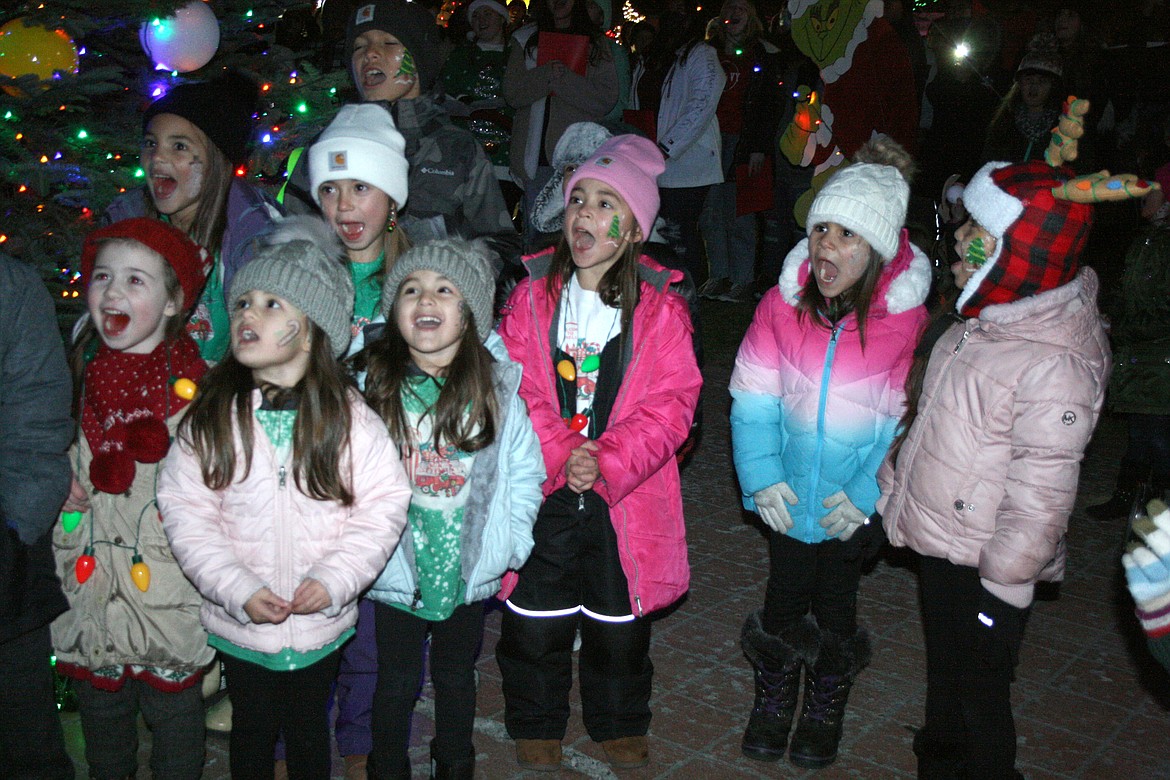 Kids count down the seconds to the lighting of the community Christmas tree in Othello during A Christmas Miracle on Main Street Saturday.