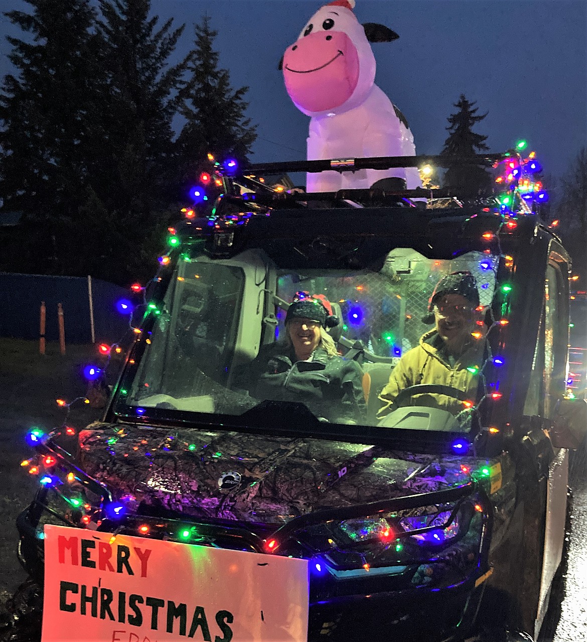 A small but intrepid troupe made sure the annual St. Ignatius Parade of Lights brought the Christmas spirit, in spite of a frigid downpour. (Carolyn Hidy/Lake County Leader)