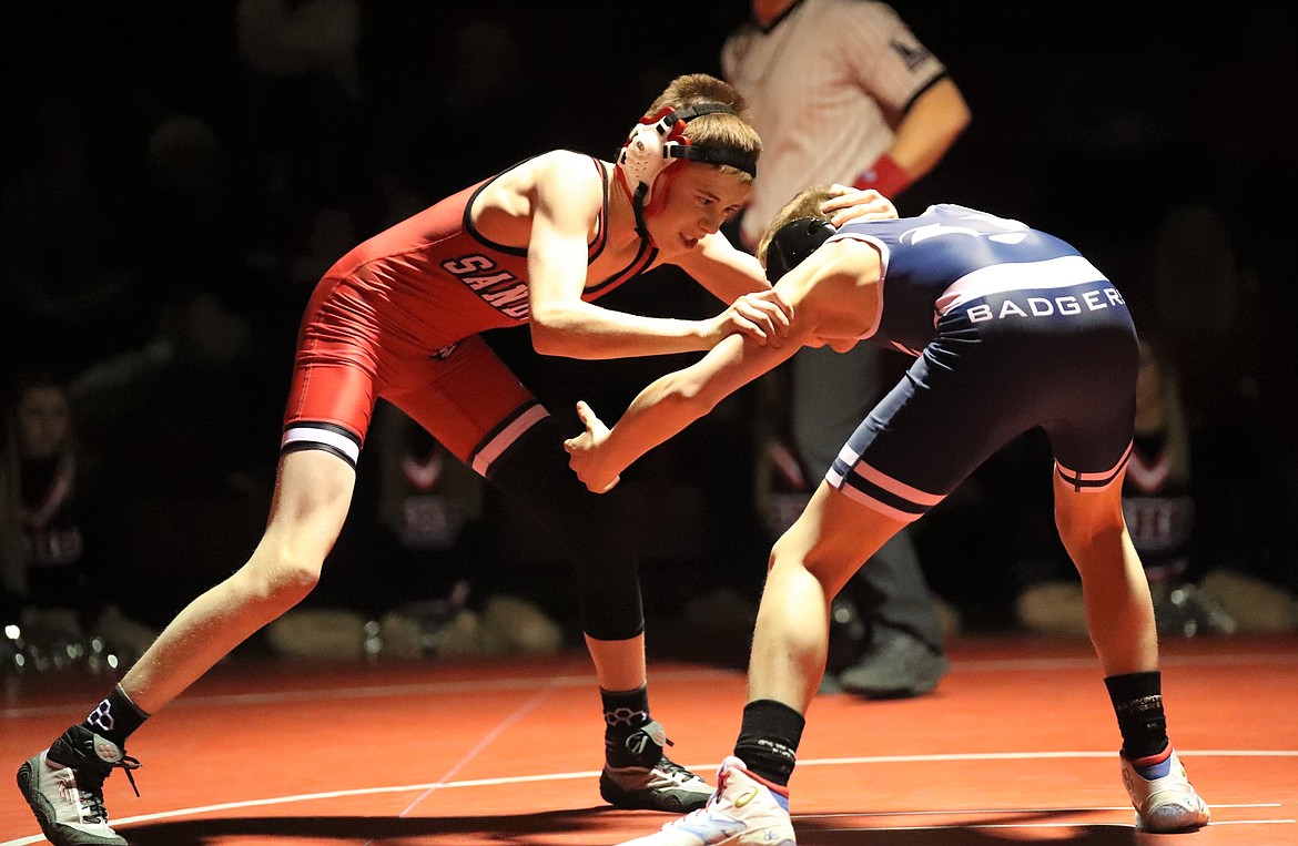 Andrew Duke (left) battles Brandon Williams from Bonners Ferry in a 98-pound bout Wednesday.