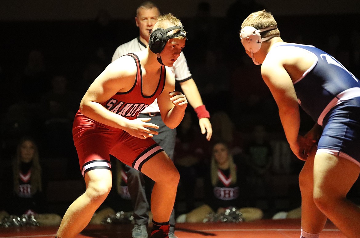 Austin Smith (left) faces off with Jackson Richter from Bonners Ferry on Wednesday.