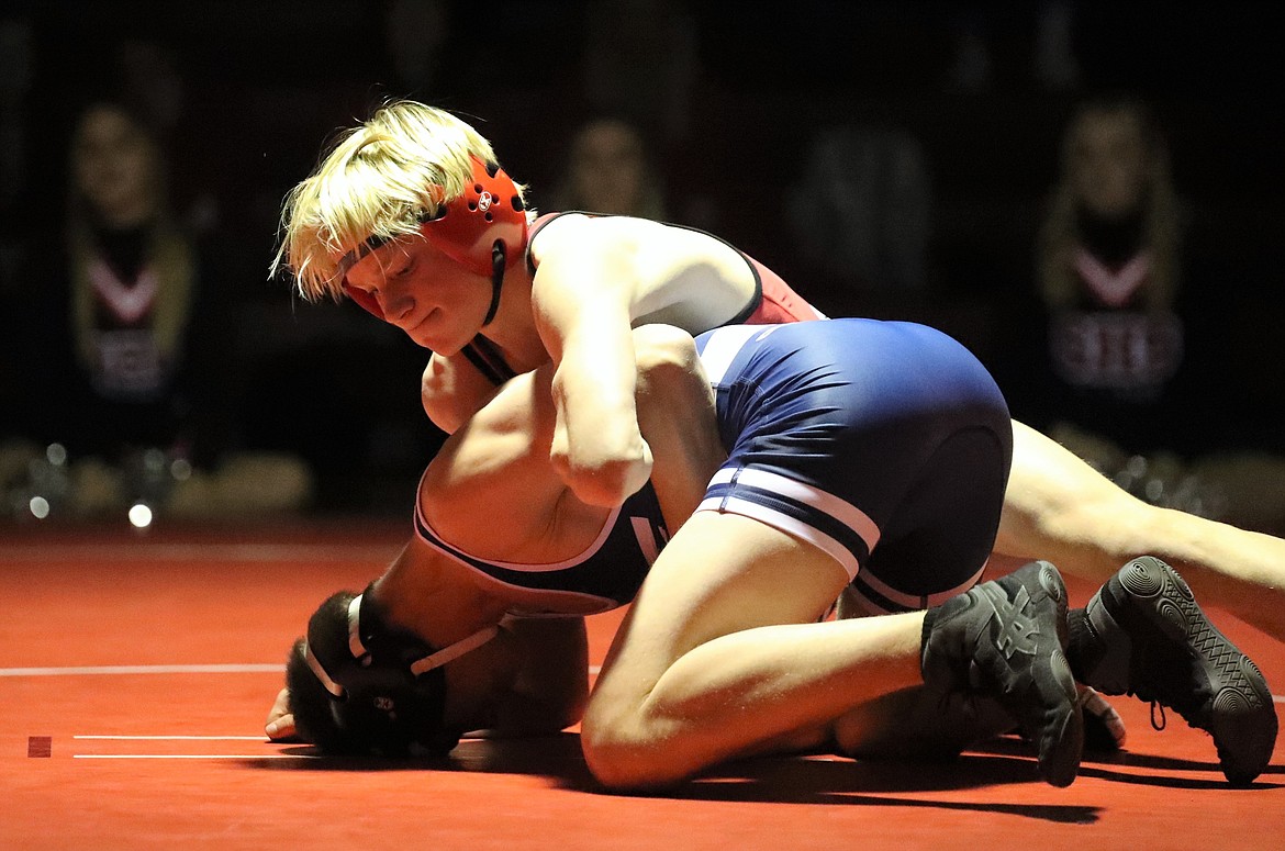 Forrest Ambridge takes control during his match with Bonners Ferry's Porter Blackmore on Wednesday.