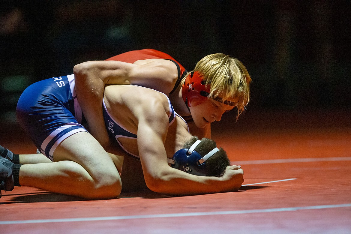 Forrest Ambridge takes control during his 132-pound match with Porter Blackmore on Wednesday. He won the match by pin.
