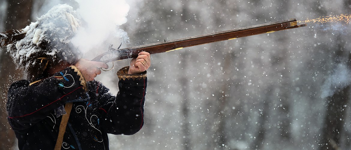 Rod Douglas fires a shot with his English trade rifle during a gathering of Flathead Muzzleloaders Association near Columbia Falls Saturday, Dec. 4. (Jeremy Weber/Daily Inter Lake)