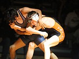 PREP WRESTLING: Trojans take it to Timberwolves
