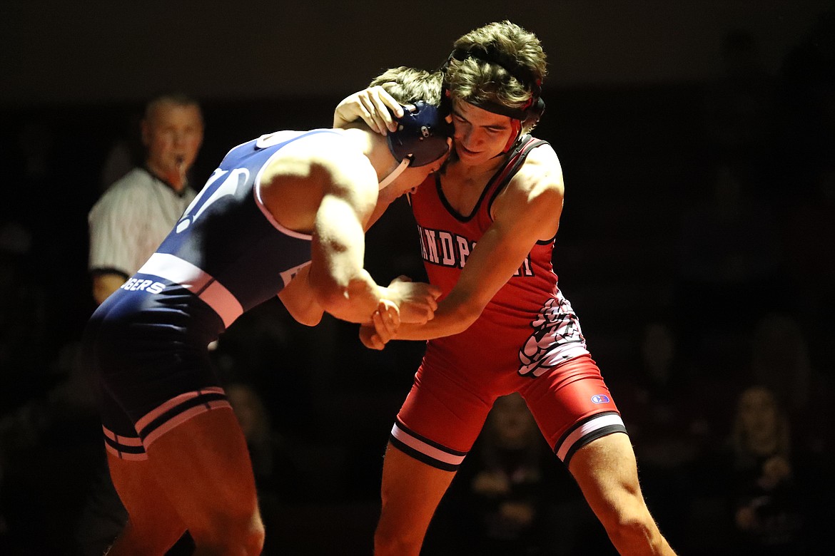 Wyatt Marker (right) battles Tully Reinhardt from Bonners Ferry on Wednesday.