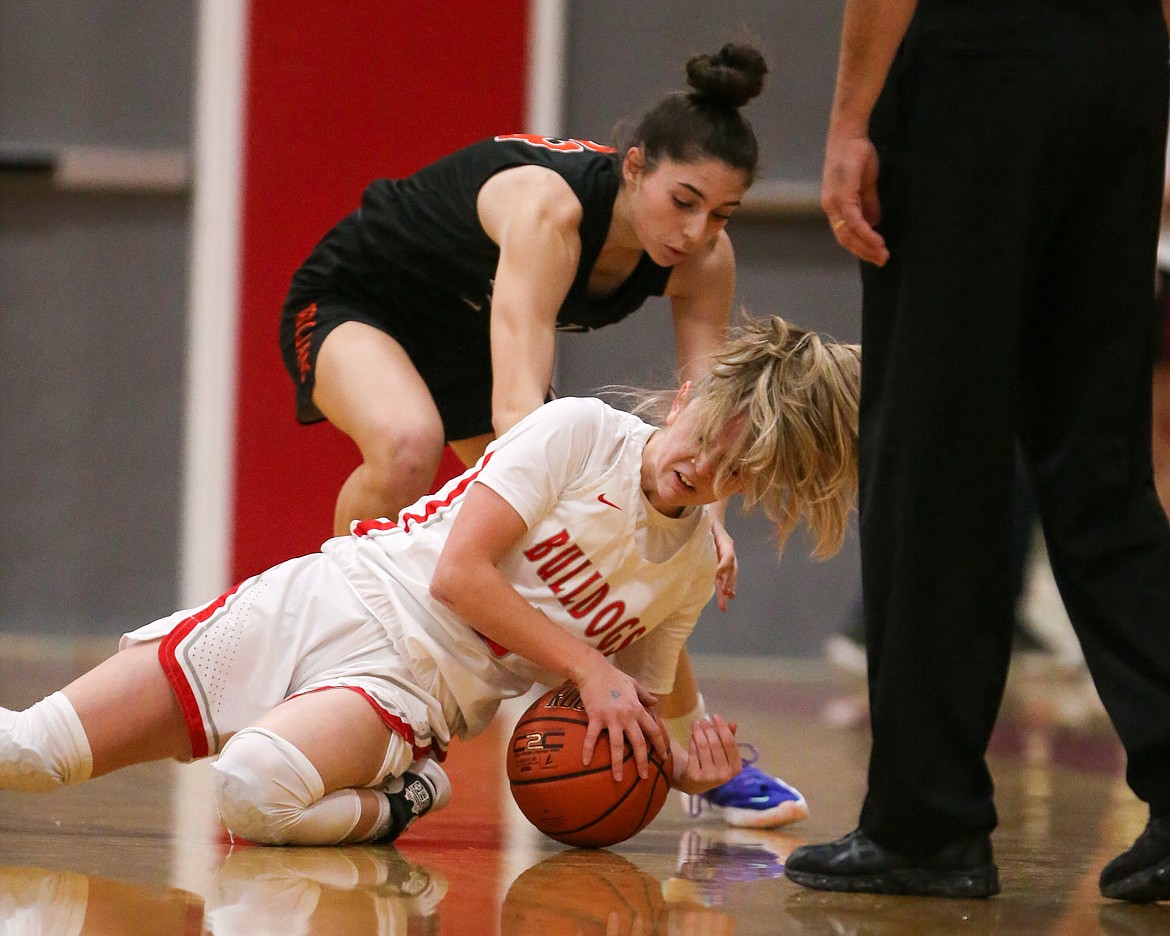 Daylee Driggs fights for a loose ball during Friday's game.