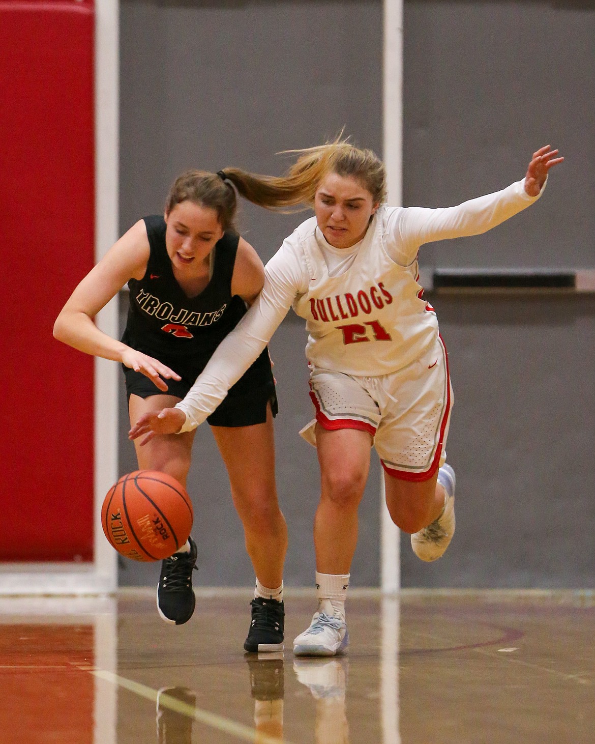 Destiny Lyons tries to fend off a Post Falls defender during Friday's game.