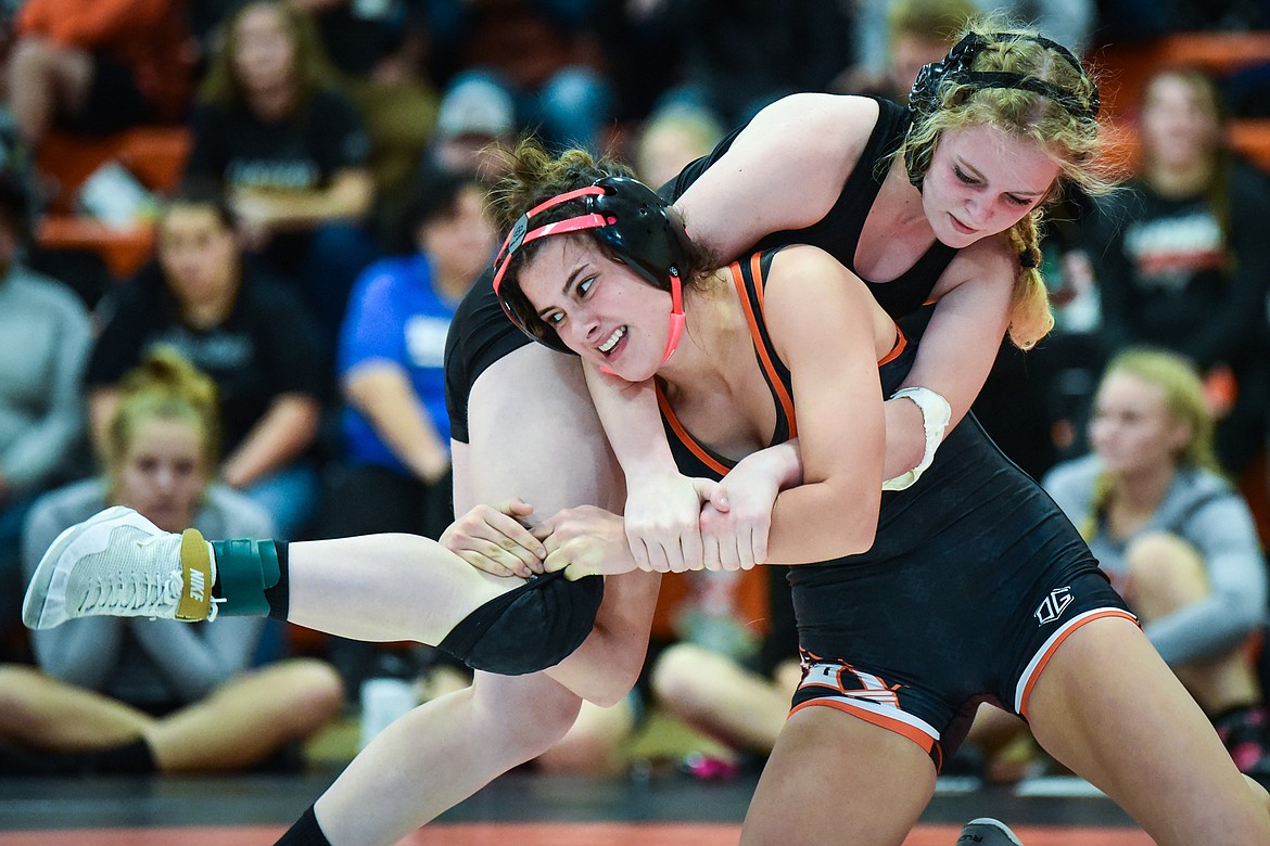 Flathead's Isabella Arriaga wrestles Chester-Joplin-Inverness' Savannah Riggin at 126 lbs. at the Flathead Girls Invitational at Flathead High School on Saturday, Dec. 11. (Casey Kreider/Daily Inter Lake)