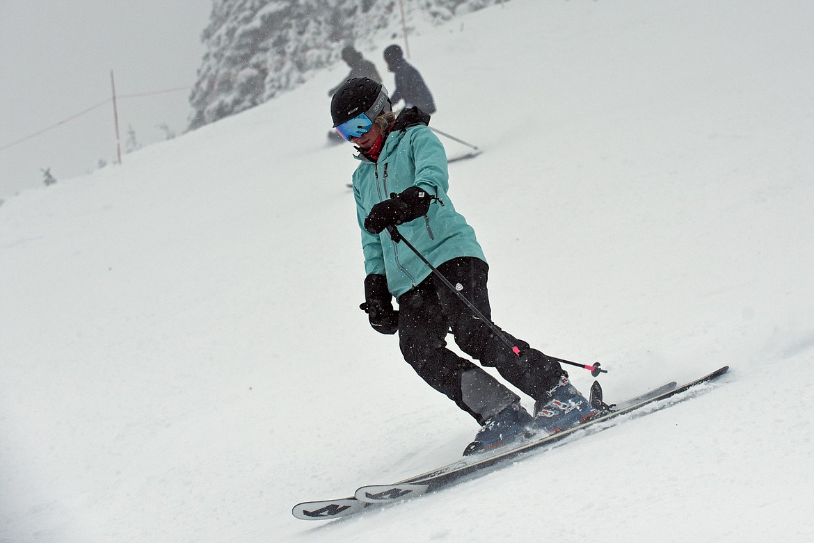 A skier speeds down the top of Russ's Street at Whitefish Mountain Resort's opening day of the 2021-22 season Thursday, Dec. 9. (Whitney England/Whitefish Pilot)