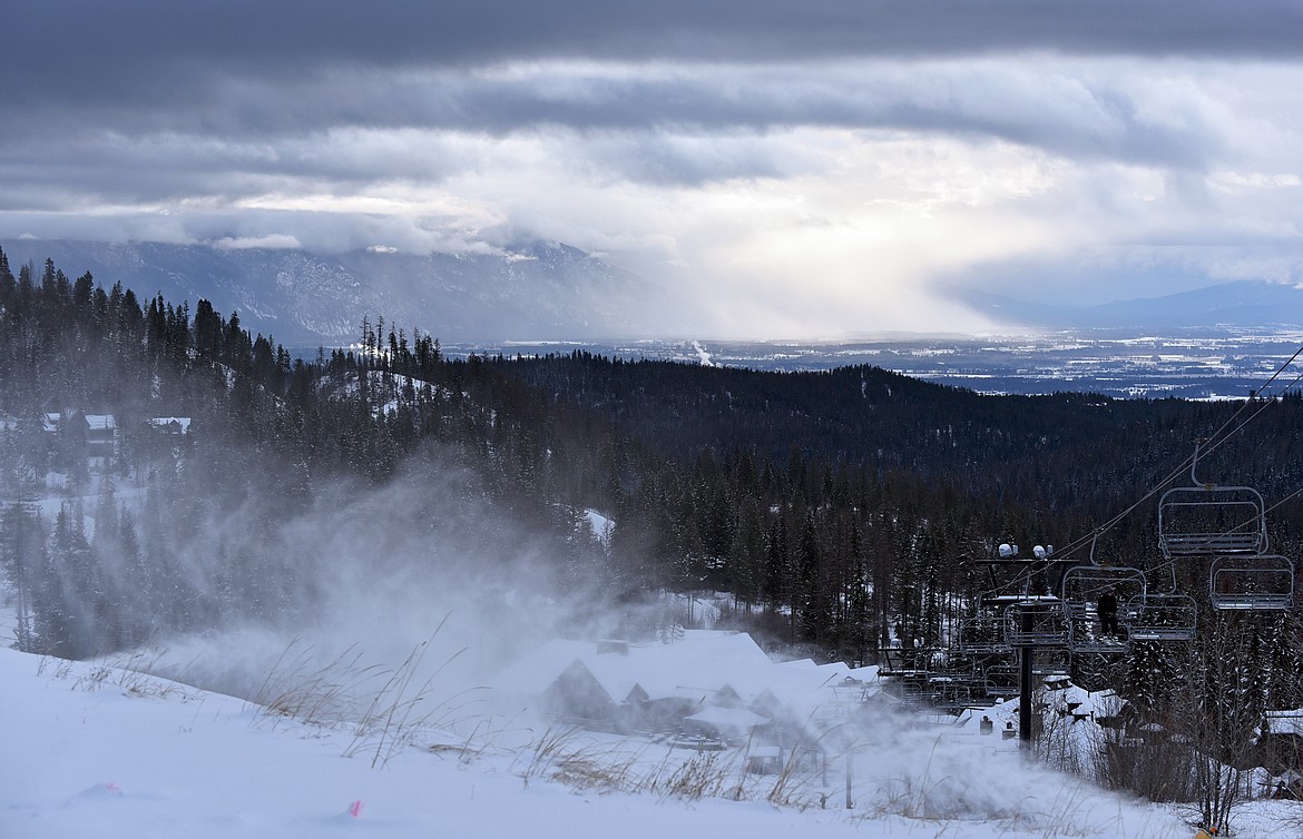 The sun periodically broke through the clouds in the early morning during Whitefish Mountain Resort's opening day of the 2021-22 season Thursday, Dec. 9. (Whitney England/Whitefish Pilot)