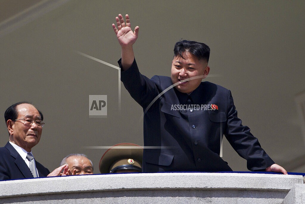 In this April 15, 2012, file photo, North Korean leader Kim Jong Un waves from a balcony at the end of a military parade at Kim Il Sung Square in Pyongyang, North Korea. Since taking power after his father's death in 2011, Kim has spent 10 years erasing doubts that he was too young and weak to extend his family’s brutal dynastic grip over the impoverished, nuclear-armed state. (AP Photo/David Guttenfelder, File)